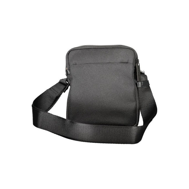 Black Polyester Men Shoulder BagElevate your accessory game with the sleek Calvin Klein Shoulder Bag — where functionality meets minimalist luxury. This piece boasts a sharp black hue enhanced by contrasting details for that touch of edge. Equipped with a