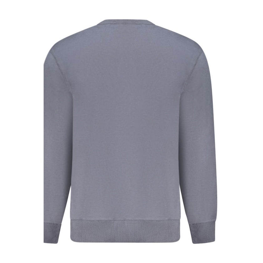 Blue Cotton Men SweaterUnleash timeless sophistication with this Calvin Klein crew neck sweatshirt. Crafted from premium 95% regenerative cotton, it boasts a plush brushed texture that exemplifies comfort with a conscience. Stand out with the contrasting