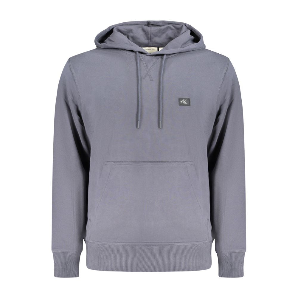 Blue Cotton Men SweaterCrafted by the iconic Calvin Klein, this long-sleeved hooded sweatshirt is the epitome of comfort fused with style. Made with 95% regenerative cotton, it’s a sustainable choice that doesn’t compromise on luxury. Exquisitely brushed