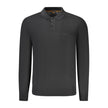 Black Wool Men SweaterElevate your wardrobe with the epitome of sophistication—the Hugo Boss Long Sleeved Sweater. This sleek black staple commands attention, exuding an air of refinement with its subtle embroidery and iconic logo detail. Crafted with a l