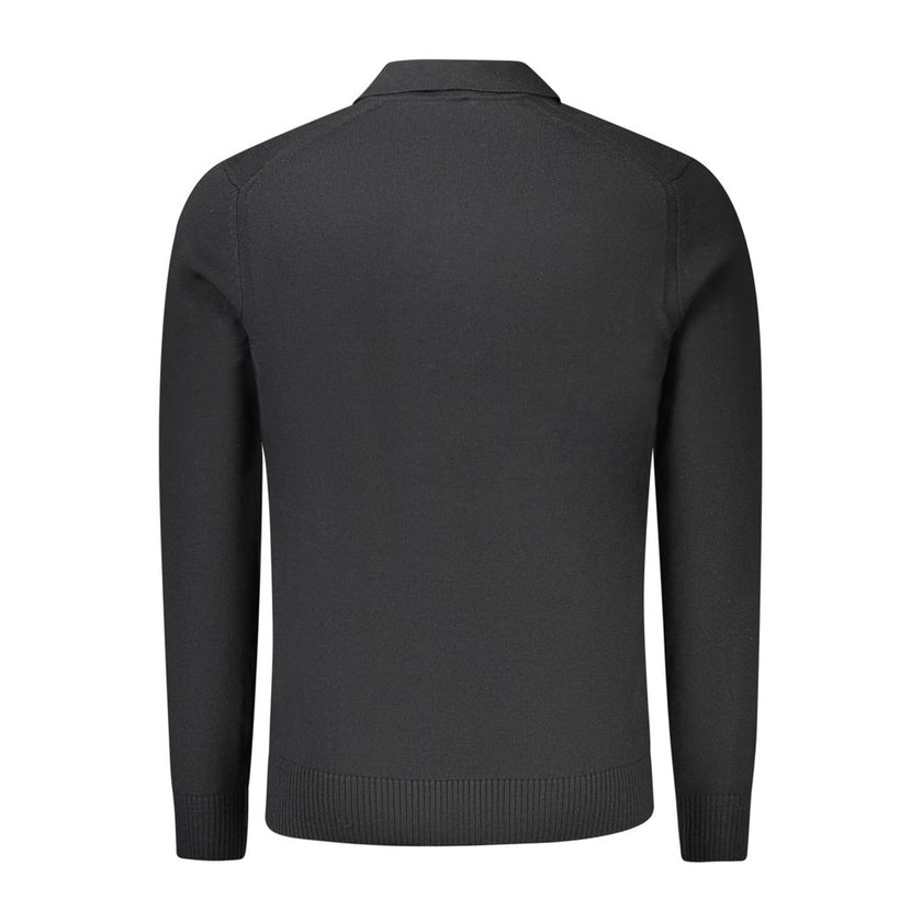 Black Wool Men SweaterElevate your wardrobe with the epitome of sophistication—the Hugo Boss Long Sleeved Sweater. This sleek black staple commands attention, exuding an air of refinement with its subtle embroidery and iconic logo detail. Crafted with a l