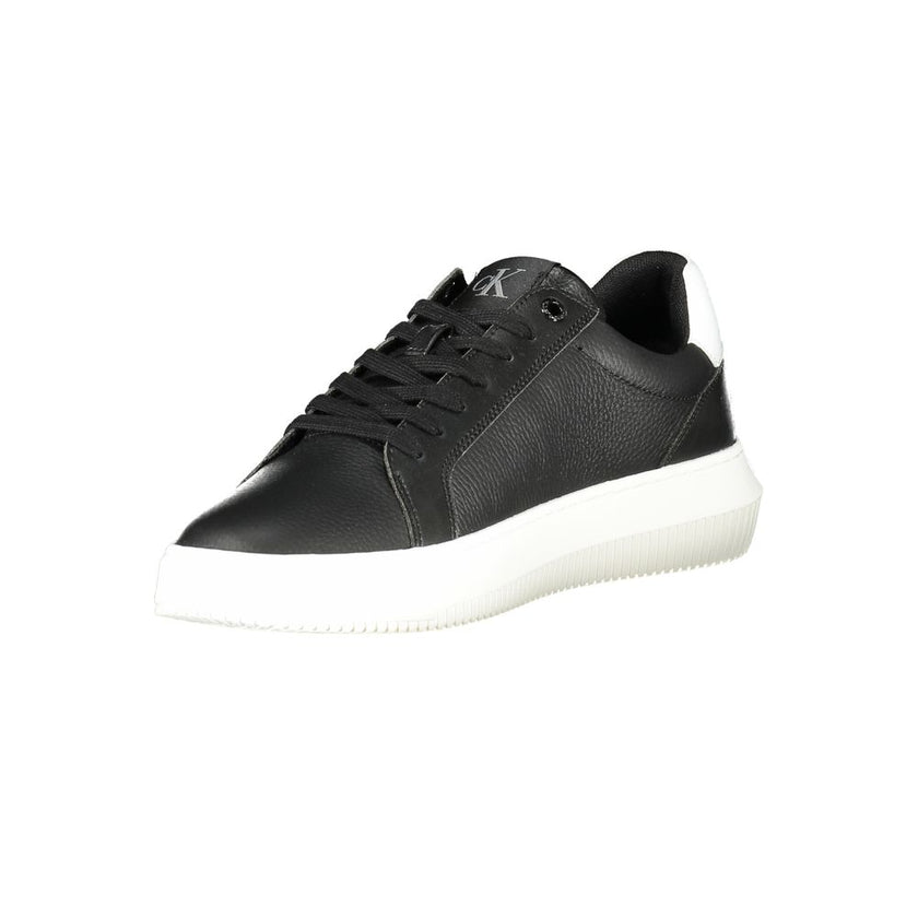 Black Leather Men SneakerUnleash your street style with the audacious elegance of Calvin Klein’s sneakers. Engineered for the fashion-forward, these kicks are a testament to modern design with bold contrasting white details and the iconic logo display. Wh