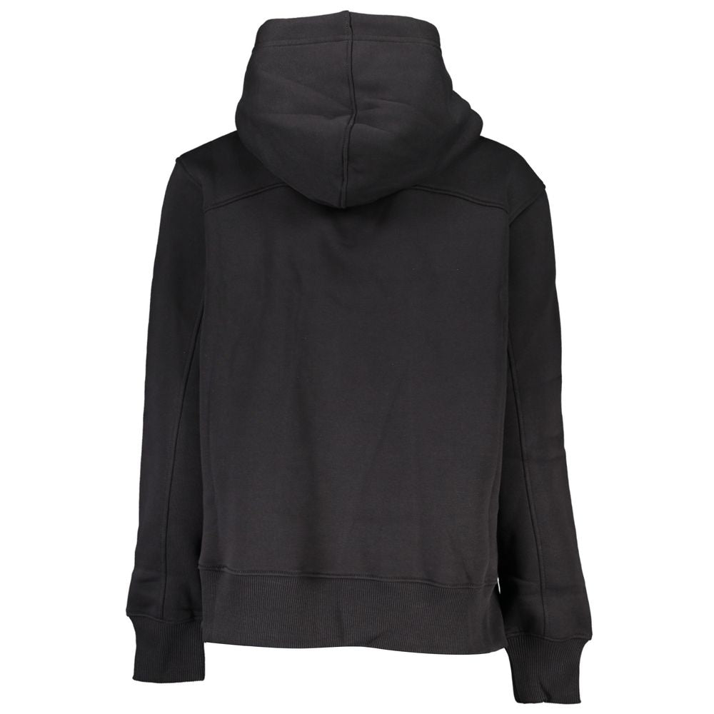 Black Cotton Women SweaterExperience the epitome of urban chic with Calvin Klein’s sleek sweatshirt, perfect for fashion-forward individuals who value eco-conscious luxury. Crafted with attention to detail, this black hoodie features a blend of plush flee