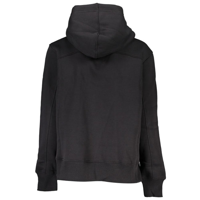 Black Cotton Women SweaterExperience the epitome of urban chic with Calvin Klein’s sleek sweatshirt, perfect for fashion-forward individuals who value eco-conscious luxury. Crafted with attention to detail, this black hoodie features a blend of plush flee