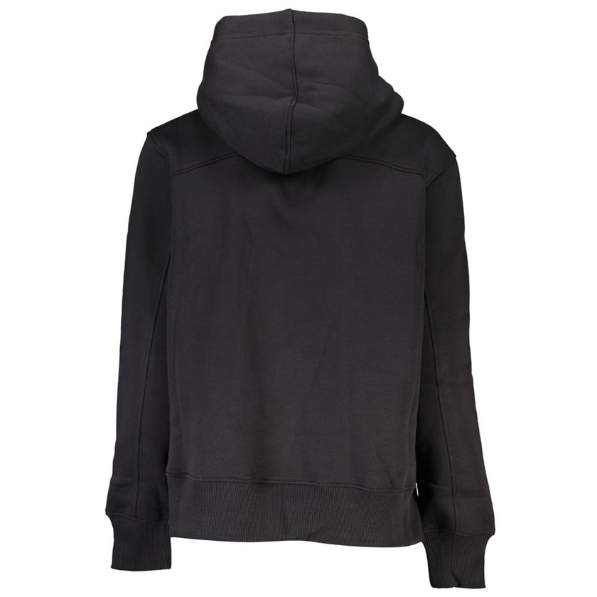 Black Cotton Women SweaterExperience the epitome of urban chic with Calvin Klein’s sleek sweatshirt, perfect for fashion-forward individuals who value eco-conscious luxury. Crafted with attention to detail, this black hoodie features a blend of plush flee
