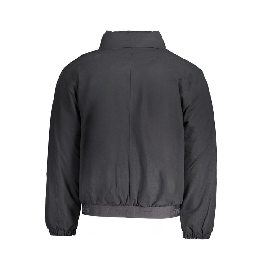 Black Polyester Men's JacketDive into the sleek sophistication of Calvin Klein with this versatile long sleeve jacket that seamlessly blends function with style. Boasting a removable hood for those unpredictable weather changes, it assures you stay ahead