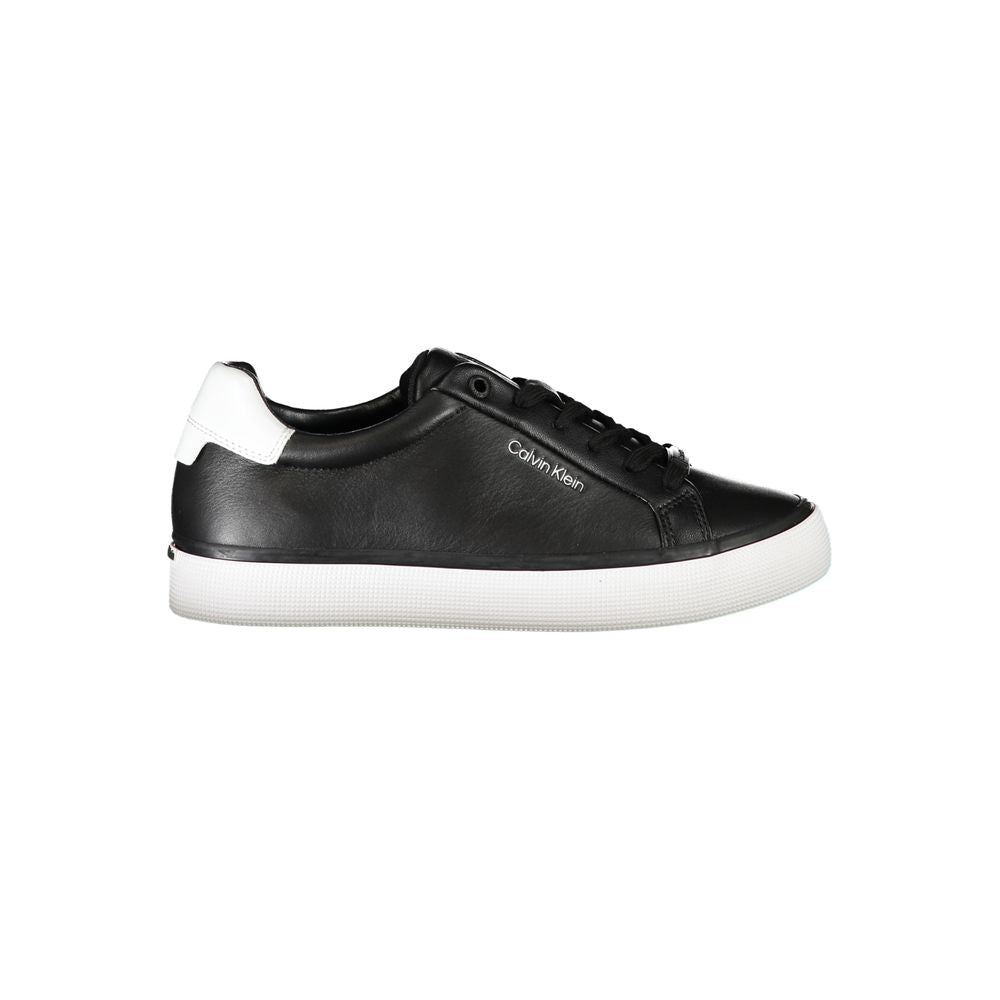 Chic Laced Sports Sneakers with Contrast DetailsStep out in style with these trendy Calvin Klein sneakers, perfect for adding a sporty edge to any outfit. Featuring a sleek black design with eye-catching contrast details and the iconic logo, these eco-fri