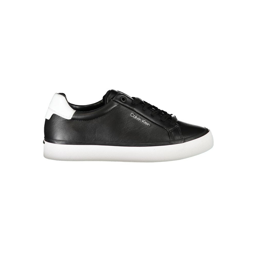 Chic Laced Sports Sneakers with Contrast DetailsStep out in style with these trendy Calvin Klein sneakers, perfect for adding a sporty edge to any outfit. Featuring a sleek black design with eye-catching contrast details and the iconic logo, these eco-fri