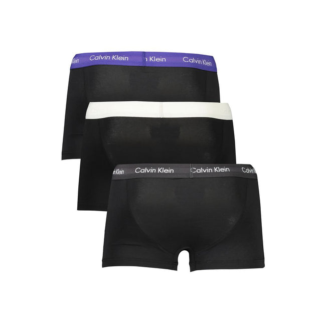 Sleek Tri-Pack Elastic Waist BoxersExperience the ultimate comfort and style with our sleek three-pack boxers, featuring a snug elastic waistband and adorned with a subtle logo. Ideal for the modern man who values both form and function in his everyday es