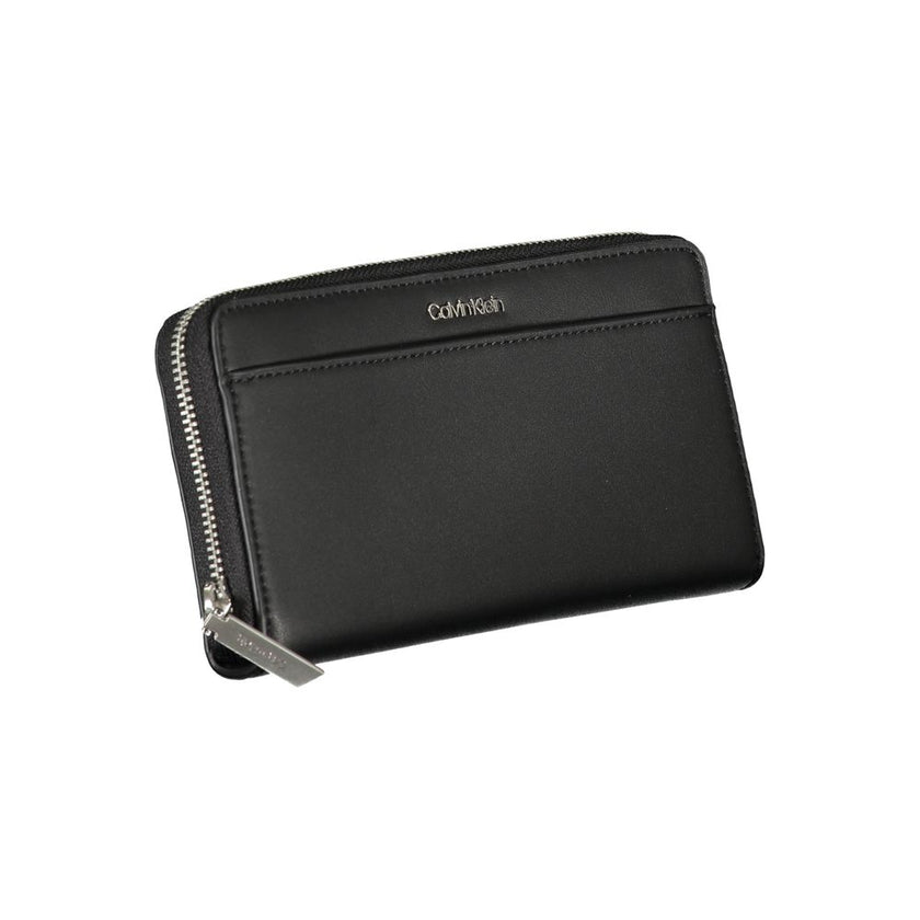 Elegant Black RFID Secure WalletExperience the perfect blend of functionality and style with this Calvin Klein wallet, designed to keep your essentials organized and secure. Crafted with sustainability in mind, it features a smart RFID blocking system to