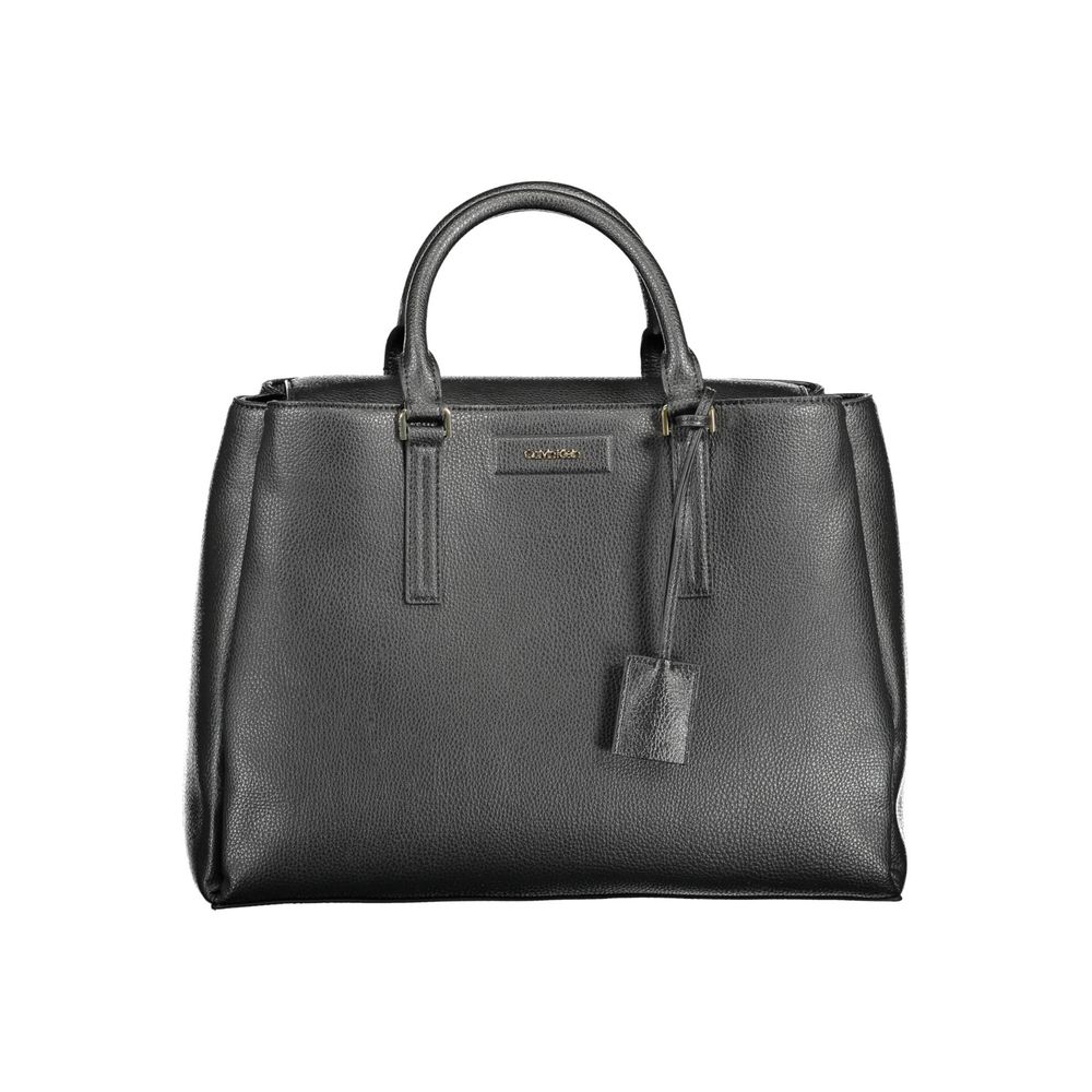Black Recycled Polyester Women HandbagStep into the world of eco-chic sophistication with Calvin Klein’s stunning handbag, a testament to contemporary style fused with environmentally mindful design. Crafted with 100% recycled polyester, this sleek black