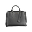 Black Recycled Polyester Women HandbagStep into the world of eco-chic sophistication with Calvin Klein’s stunning handbag, a testament to contemporary style fused with environmentally mindful design. Crafted with 100% recycled polyester, this sleek black