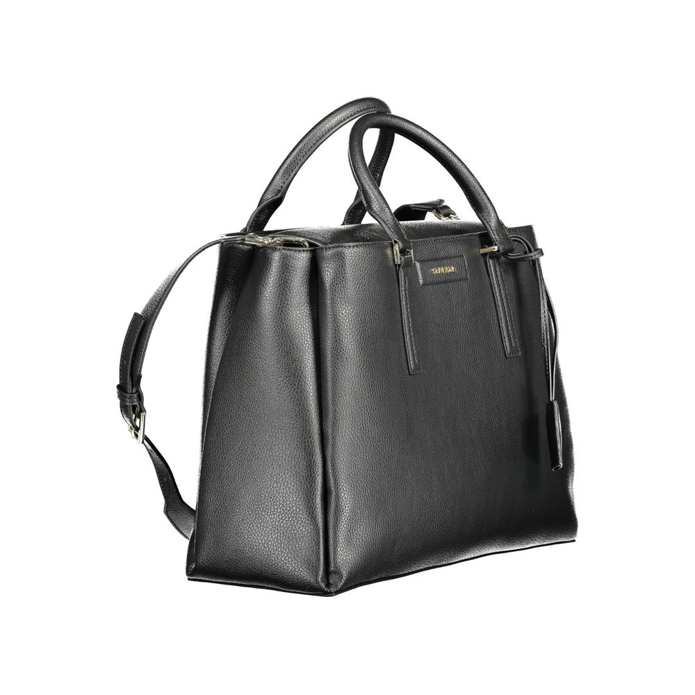 Black Recycled Polyester Women HandbagStep into the world of eco-chic sophistication with Calvin Klein’s stunning handbag, a testament to contemporary style fused with environmentally mindful design. Crafted with 100% recycled polyester, this sleek black