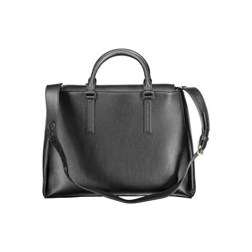 Black Recycled Polyester Women HandbagStep into the world of eco-chic sophistication with Calvin Klein’s stunning handbag, a testament to contemporary style fused with environmentally mindful design. Crafted with 100% recycled polyester, this sleek black
