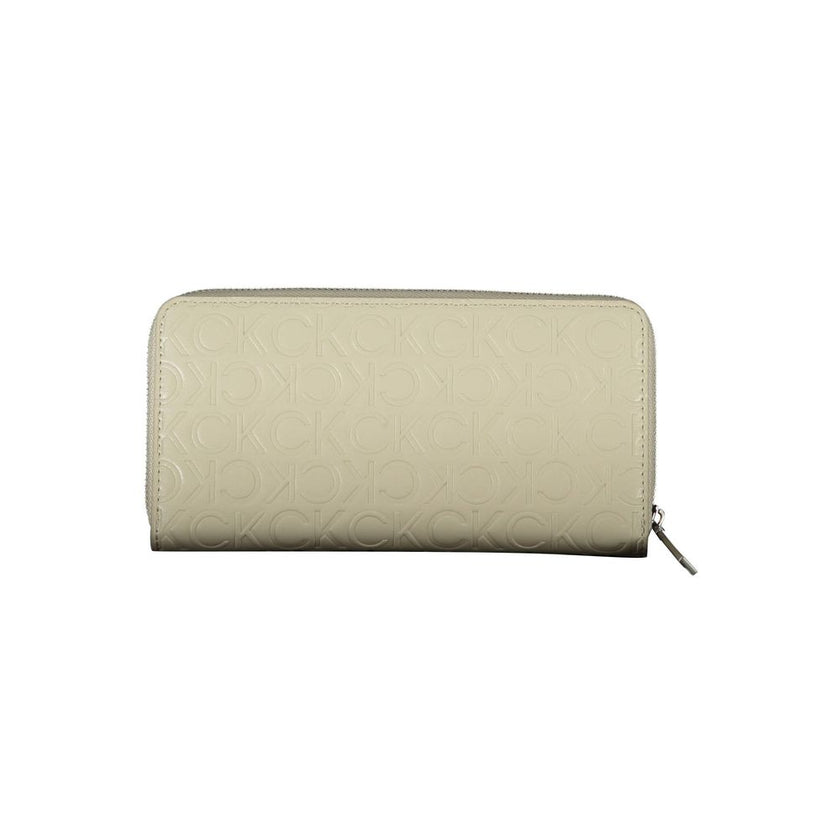 Beige Polyethylene Women WalletOutfit your essentials in the sleek silhouette of Calvin Klein’s premium wallet, crafted for the modern trendsetter. This accessory blends practicality with style, featuring a quintet of compartments to expertly organize you