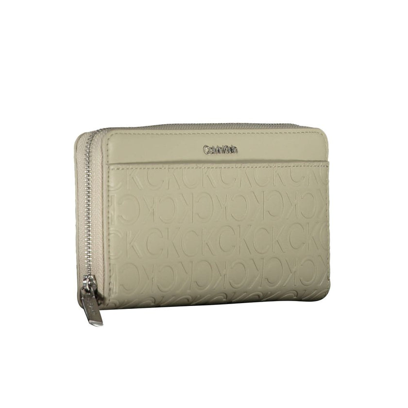 Beige Polyethylene Women WalletOutfit your essentials in the sleek silhouette of Calvin Klein’s premium wallet, crafted for the modern trendsetter. This accessory blends practicality with style, featuring a quintet of compartments to expertly organize you