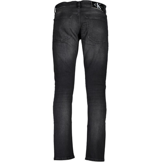 Black Cotton Men JeansElevate your denim game with these sleek Calvin Klein jeans, tailored to perfection in a slim fit silhouette. Embellished with a chic washed effect and stamped proudly with the brand’s iconic logo, these jeans are the epitome of mode