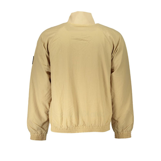 Beige Polyamide Men JacketExperience the epitome of sporty sophistication with Calvin Klein’s long-sleeved sports jacket. Expertly crafted to elevate your everyday style, this jacket features practical elements such as two external pockets and an internal