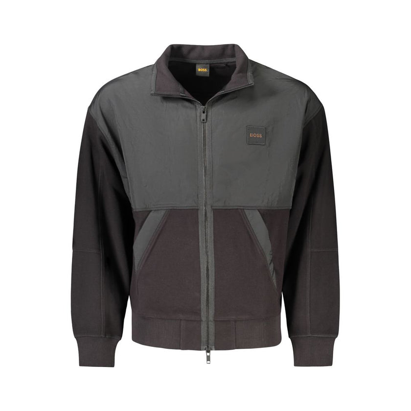 Black Cotton Men's JacketUnleash the epitome of bold sophistication with the Hugo Boss long sleeve jacket. Crafted from premium cotton for unrivaled comfort, this stylish piece boasts striking contrasting details that command attention. Function meets fas