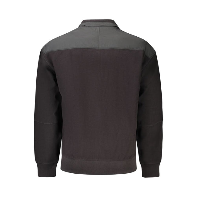 Black Cotton Men's JacketUnleash the epitome of bold sophistication with the Hugo Boss long sleeve jacket. Crafted from premium cotton for unrivaled comfort, this stylish piece boasts striking contrasting details that command attention. Function meets fas