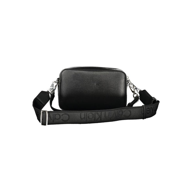 Black Polyethylene Women HandbagIndulge in the epitome of sophistication with this sleek Calvin Klein handbag, a perfect blend of functionality and high-fashion allure. Featuring an adjustable and removable shoulder strap alongside a chic shoulder handle,