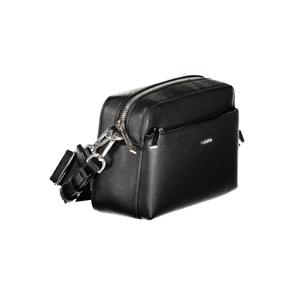Black Polyethylene Women HandbagIndulge in the epitome of sophistication with this sleek Calvin Klein handbag, a perfect blend of functionality and high-fashion allure. Featuring an adjustable and removable shoulder strap alongside a chic shoulder handle,