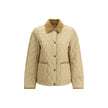Quilted JacketBurberry’s Quilted Jacket is made of lightweight nylon with a cotton twill interior decorated with the classic Burberry Check pattern in sand color. The model has a slim fit and features tone-on-tone corduroy collar and trim for a refined, u