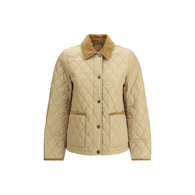 Quilted JacketBurberry’s Quilted Jacket is made of lightweight nylon with a cotton twill interior decorated with the classic Burberry Check pattern in sand color. The model has a slim fit and features tone-on-tone corduroy collar and trim for a refined, u