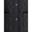 Quilted JacketBurberry’s Quilted Jacket is made of lightweight nylon with a cotton twill interior decorated with the classic Burberry Check pattern in sand color. The model has a slim fit and features tone-on-tone corduroy collar and trim for a refined, u