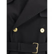 Black Cotton CoatBurberry’s Castleford long Trench Coat is a masterpiece of elegance and functionality, crafted from rain-resistant gabardine that’s perfect for braving the elements in style. The regular fit and raglan sleeves ensure comfort and freedom o