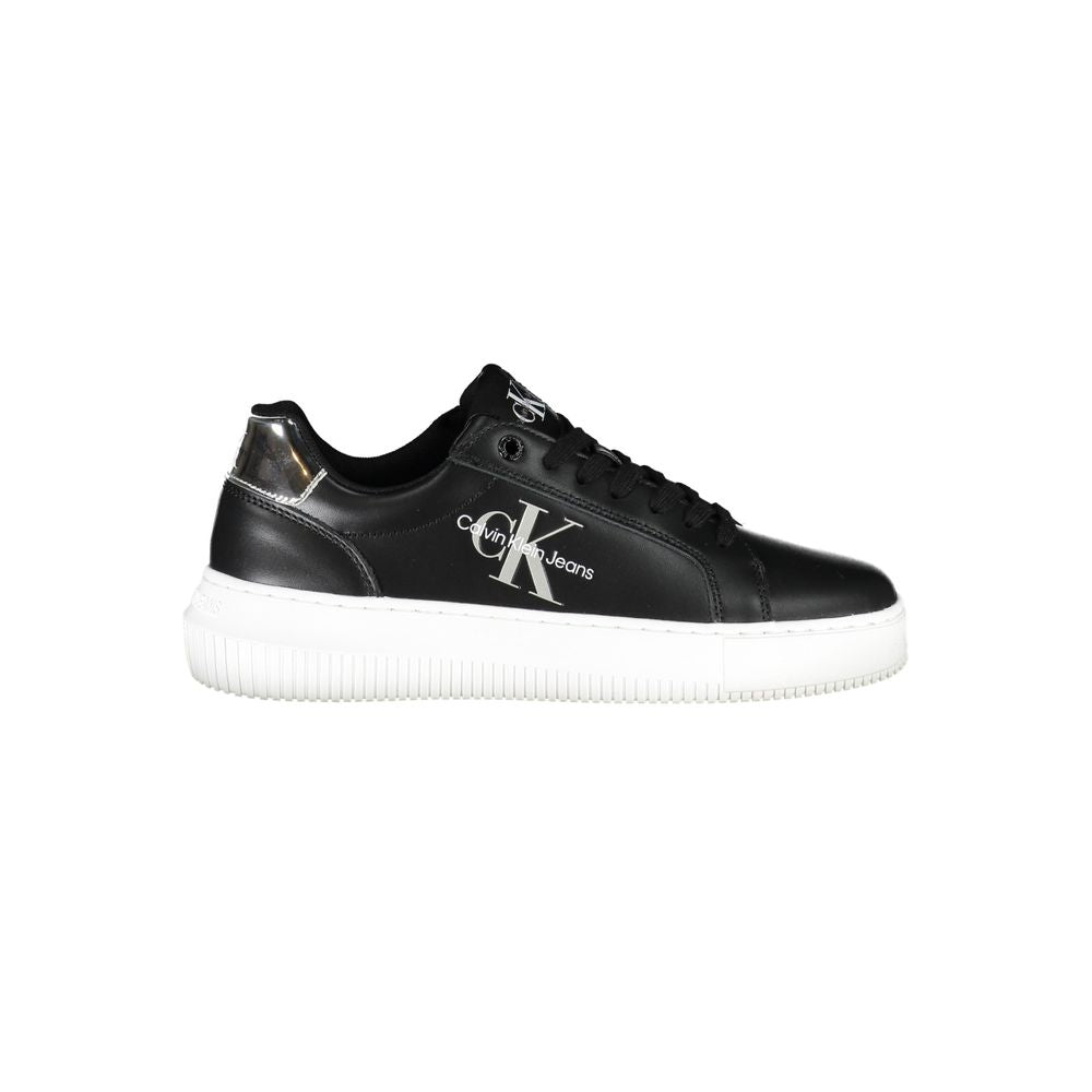 Black Polyester Women SneakerDare to stand out with Calvin Klein’s striking fusion of style and sustainability. These edgy sports shoes make a bold statement with eye-catching contrasting details and the iconic Calvin Klein logo splashed across a vibrant,