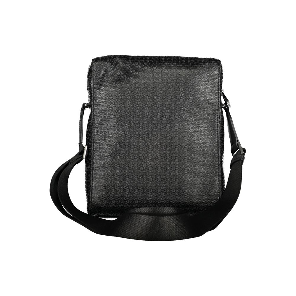 Eco-Friendly Sleek Black Shoulder BagDiscover the perfect blend of style and sustainability with our Eco-Friendly Sleek Black Shoulder Bag from Calvin Klein. Designed for the environmentally conscious fashion enthusiast, this bag features an adjustable sh