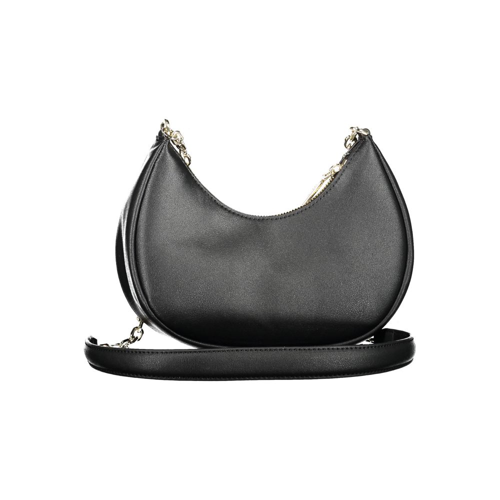 Black Polyester Women HandbagMake a powerful statement with Calvin Klein’s eco-conscious yet stunningly sophisticated shoulder bag. Crafted from a mixture of polyester and polyethylene, this sleek accessory boasts a durable and stylish chain that drapes e