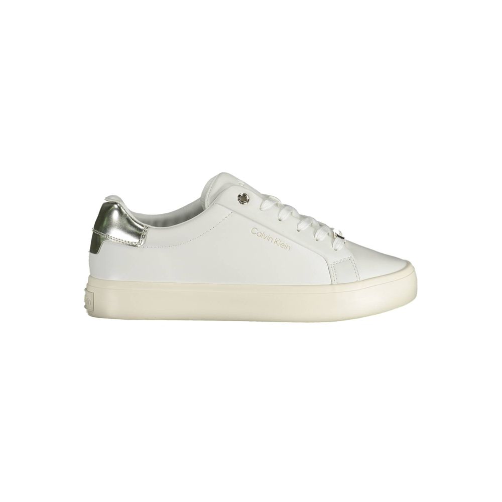 White Leather Women SneakerEmbrace the epitome of urban chic with these Calvin Klein sports sneakers. Crafted for the fashion-forward, these shoes boast a sleek white color palette with contrasting details that make a statement as you stride. The iconic C