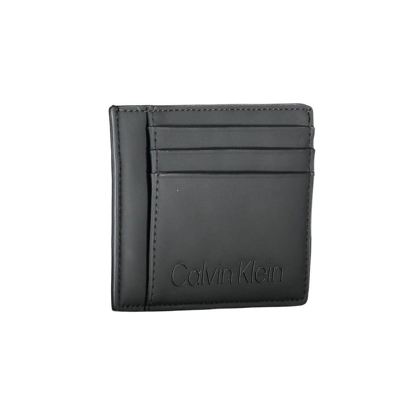 Black Polyester Men WalletElevate your essentials with Calvin Klein’s sleek card holder. The perfect blend of functionality and style, this compact accessory is designed to keep your cards organized while maintaining a sharp, fashion-forward edge. Featuri