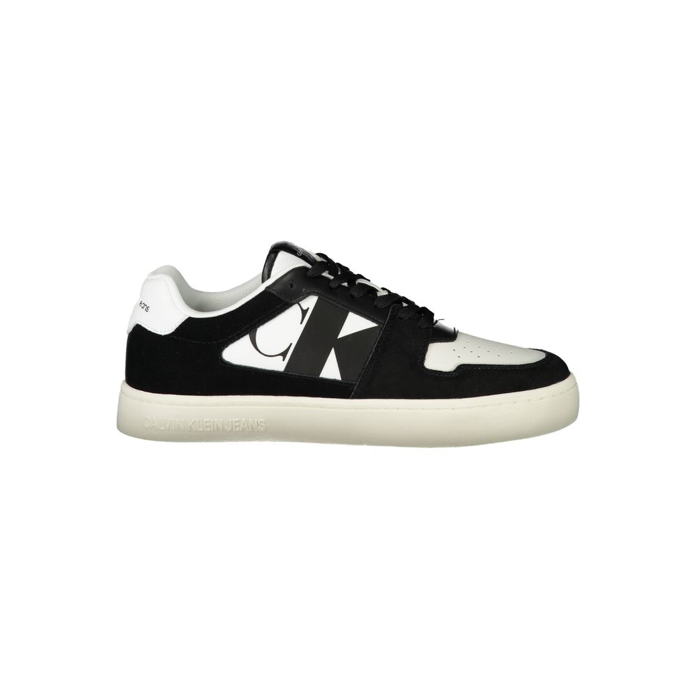 White Leather Men SneakerIndulge in the fusion of style and sustainability with Calvin Klein’s striking sneakers. Crafted for the modern trendsetter, these white kicks boast a dynamic print with bold, contrasting black details that will turn heads. A remo