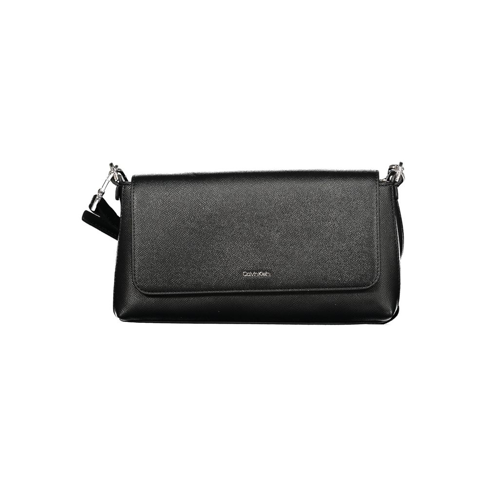Black Polyethylene Women HandbagElevate your ensemble with the sleek sophistication of a Calvin Klein handbag, a quintessential accessory for the modern fashionista. Crafted from durable polyethylene, this chic black bag seamlessly transitions from daytim