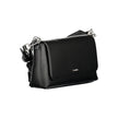Black Polyethylene Women HandbagElevate your ensemble with the sleek sophistication of a Calvin Klein handbag, a quintessential accessory for the modern fashionista. Crafted from durable polyethylene, this chic black bag seamlessly transitions from daytim