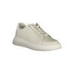 Beige Leather Women SneakerExperience the fusion of style and comfort with these Calvin Klein sneakers. Their beige sophistication is highlighted by contrasting details and the iconic Calvin Klein logo that effortlessly sets you apart from the crowd. Craf