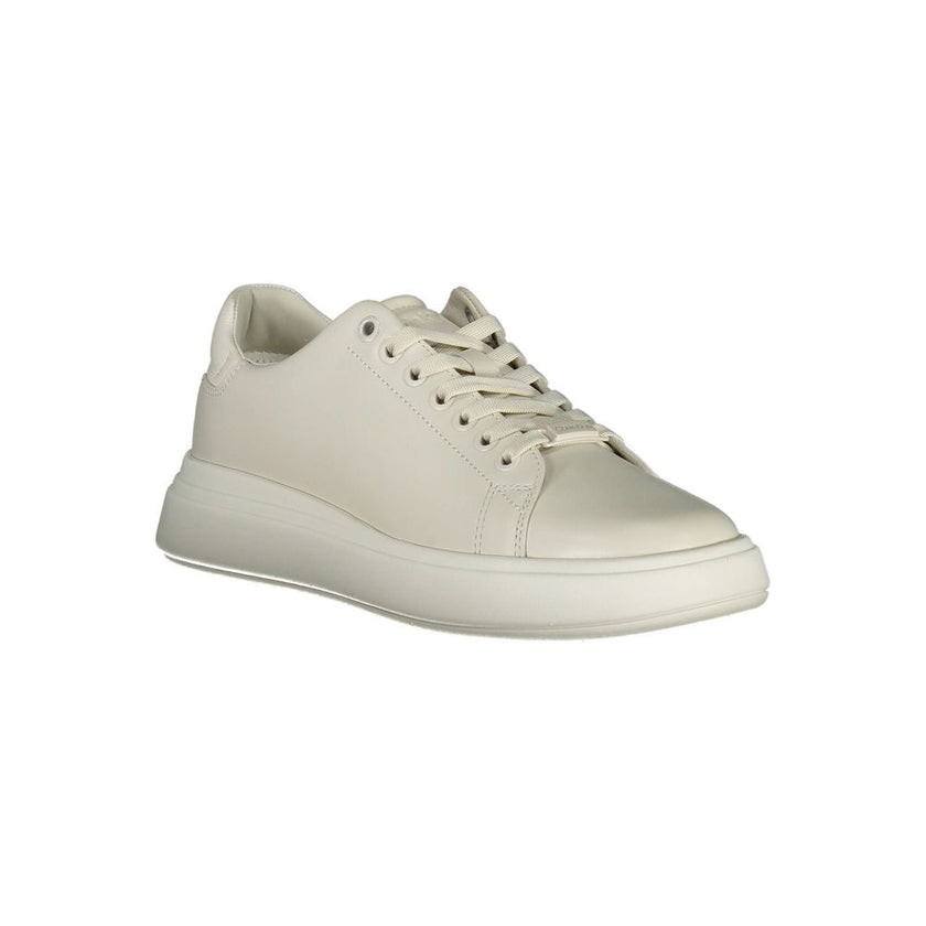 Beige Leather Women SneakerExperience the fusion of style and comfort with these Calvin Klein sneakers. Their beige sophistication is highlighted by contrasting details and the iconic Calvin Klein logo that effortlessly sets you apart from the crowd. Craf