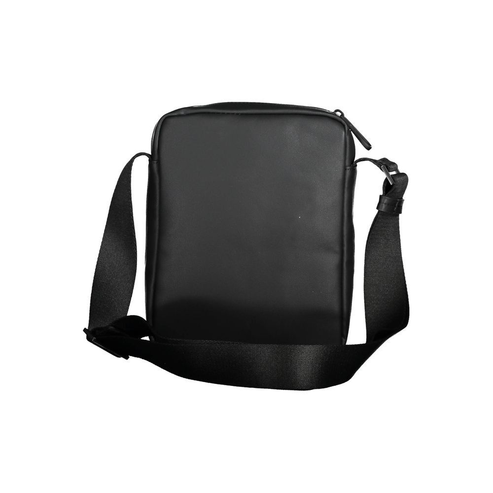 Black Polyester Men Shoulder BagExperience the pinnacle of functional style with this sleek Calvin Klein shoulder bag. Crafted from eco-conscious materials for the modern trendsetter, this bag boasts a bold black hue accentuated by contrasting details tha