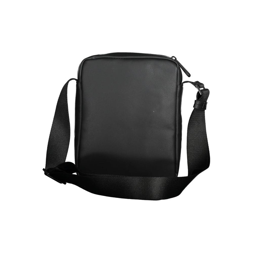 Black Polyester Men Shoulder BagExperience the pinnacle of functional style with this sleek Calvin Klein shoulder bag. Crafted from eco-conscious materials for the modern trendsetter, this bag boasts a bold black hue accentuated by contrasting details tha