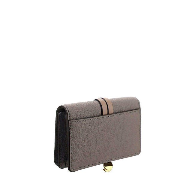 Gray Calf Leather Bos Taurus WalletAlphabet by Chloé Wallet in grained leather, elegant and functional. Featuring a charm detail that adds a touch of personality, it has a snap-button closure for security and convenience. Inside, it features a main compar