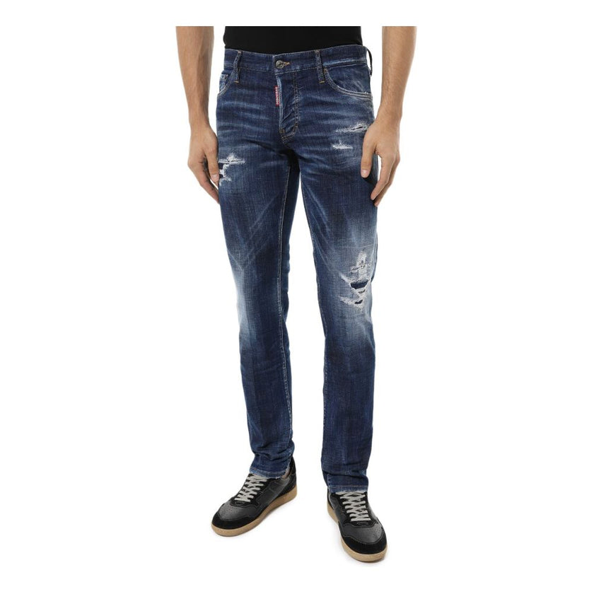Blue Cotton Men Slim JeanElevate your denim game with the unmistakable edge of Dsquared² Slim Jean jeans. These blue beauties boast an effortlessly cool, slightly faded wash punctuated by deliberate distressing that tells a story of adventure and style. F