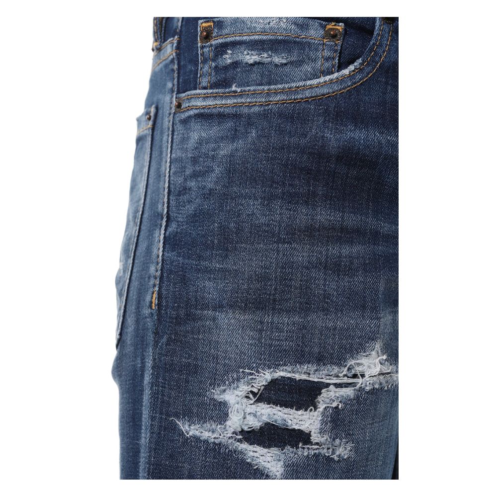 Blue Cotton Men Slim JeanElevate your denim game with the unmistakable edge of Dsquared² Slim Jean jeans. These blue beauties boast an effortlessly cool, slightly faded wash punctuated by deliberate distressing that tells a story of adventure and style. F