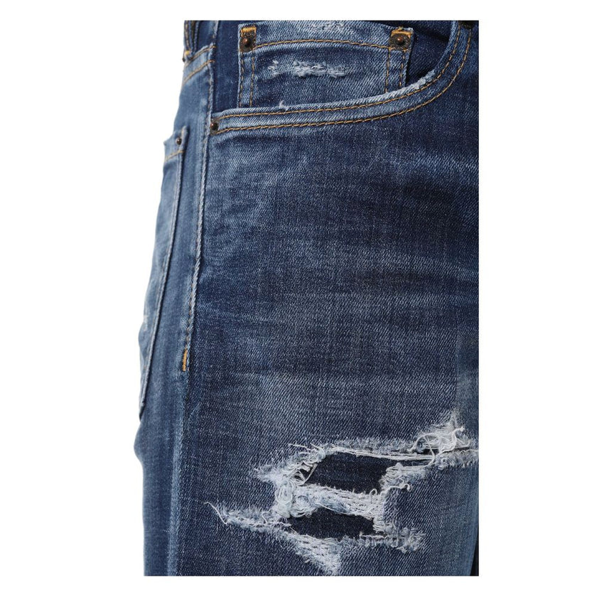 Blue Cotton Men Slim JeanElevate your denim game with the unmistakable edge of Dsquared² Slim Jean jeans. These blue beauties boast an effortlessly cool, slightly faded wash punctuated by deliberate distressing that tells a story of adventure and style. F