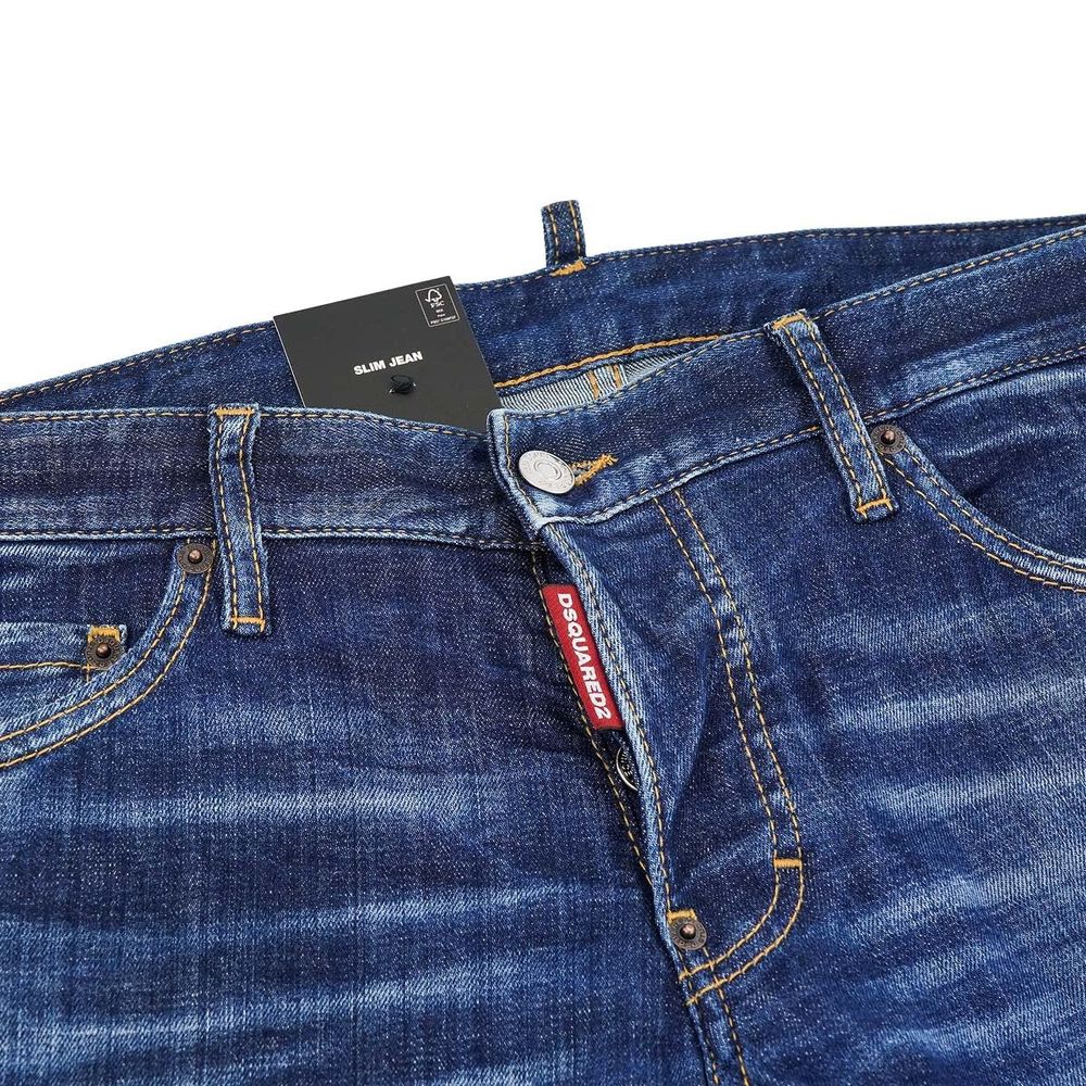 Blue Cotton Men Slim JeanElevate your denim game with the unmistakable edge of Dsquared² Slim Jean jeans. These blue beauties boast an effortlessly cool, slightly faded wash punctuated by deliberate distressing that tells a story of adventure and style. F