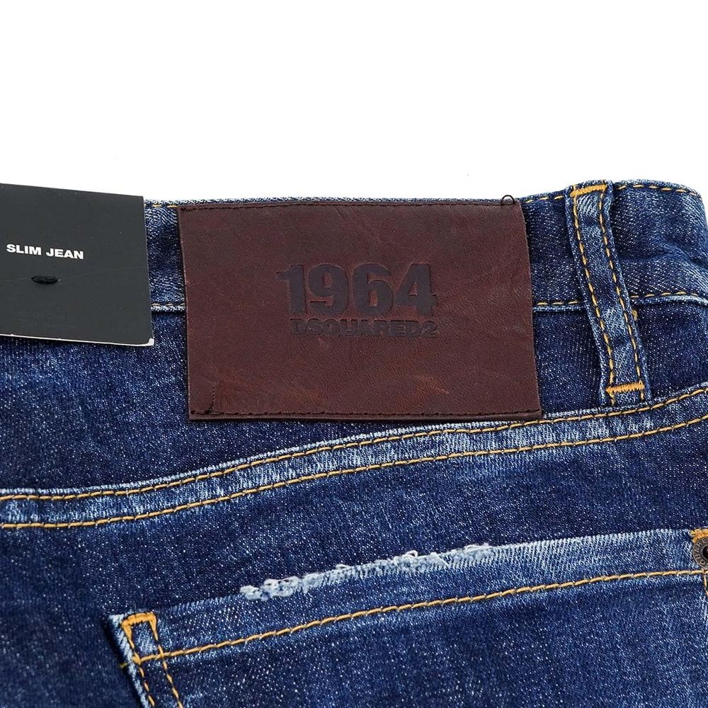 Blue Cotton Men Slim JeanElevate your denim game with the unmistakable edge of Dsquared² Slim Jean jeans. These blue beauties boast an effortlessly cool, slightly faded wash punctuated by deliberate distressing that tells a story of adventure and style. F