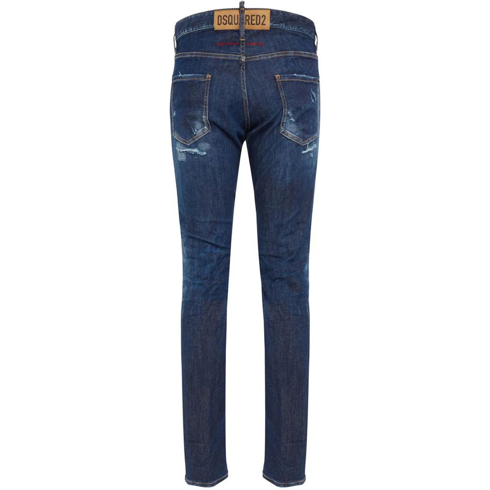 Blue Cotton Men JeansElevate your denim game with Dsquared²’s Cool Guy jeans, the epitome of rugged sophistication. Crafted in Italy, these jeans showcase edgy distressing and a tasteful fade for that perfectly worn-in look. A logo patch on the rear ensur