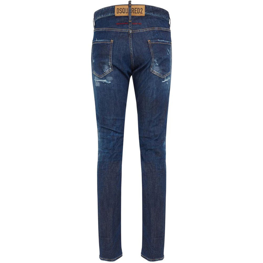 Blue Cotton Men JeansElevate your denim game with Dsquared²’s Cool Guy jeans, the epitome of rugged sophistication. Crafted in Italy, these jeans showcase edgy distressing and a tasteful fade for that perfectly worn-in look. A logo patch on the rear ensur